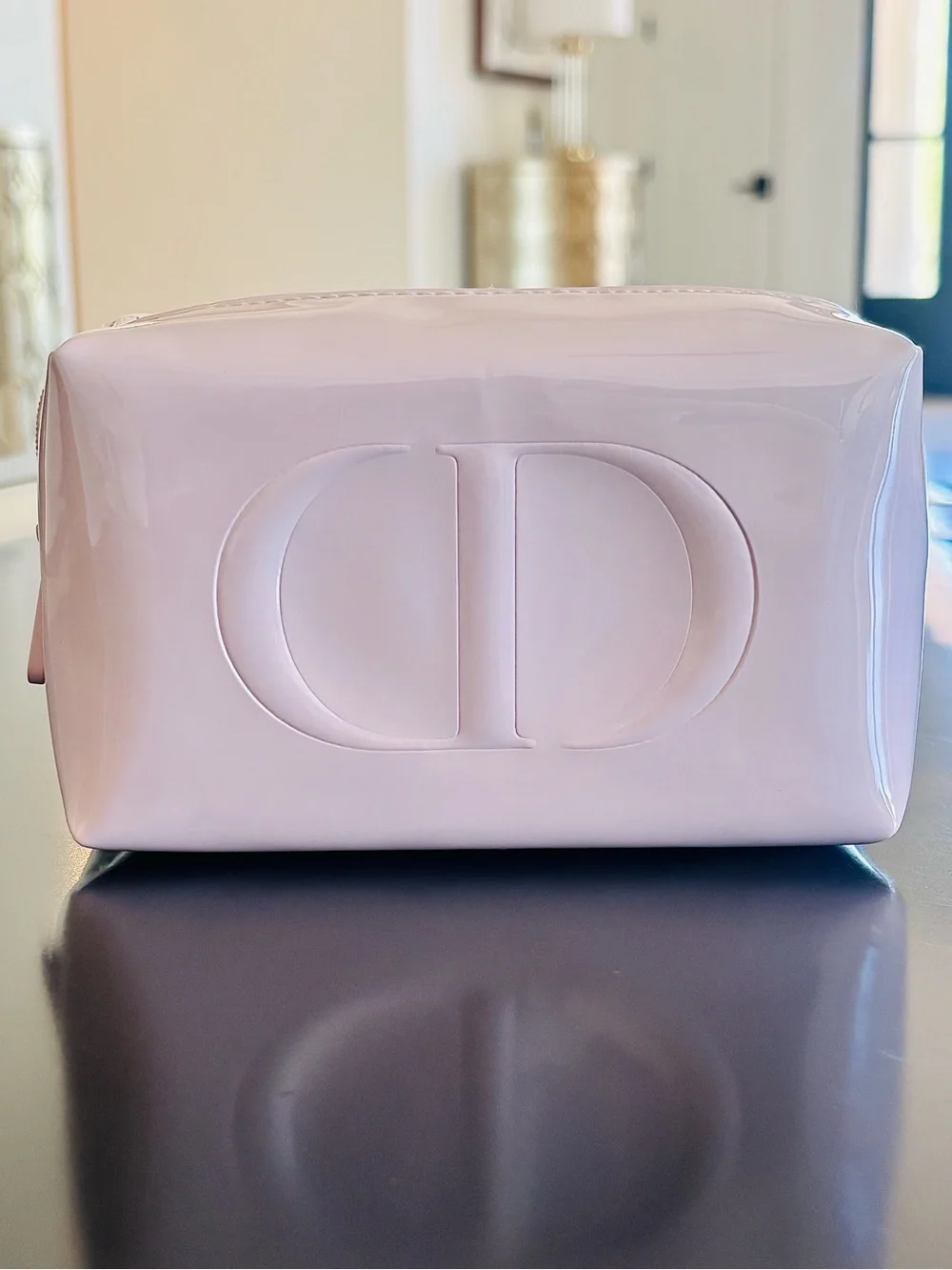Dior beauty light pink glossy cosmetic bag with embossed CD logo